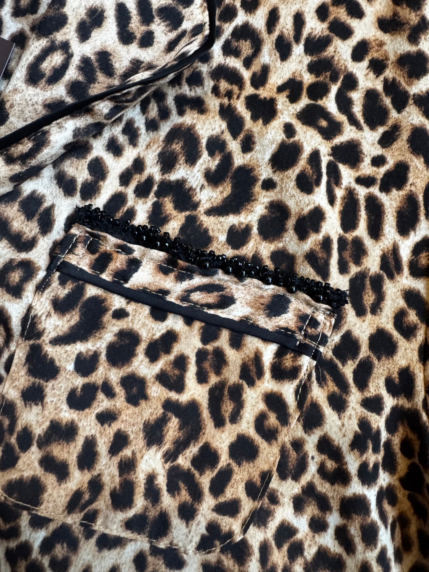 REWORK pantertop met knoopsluiting