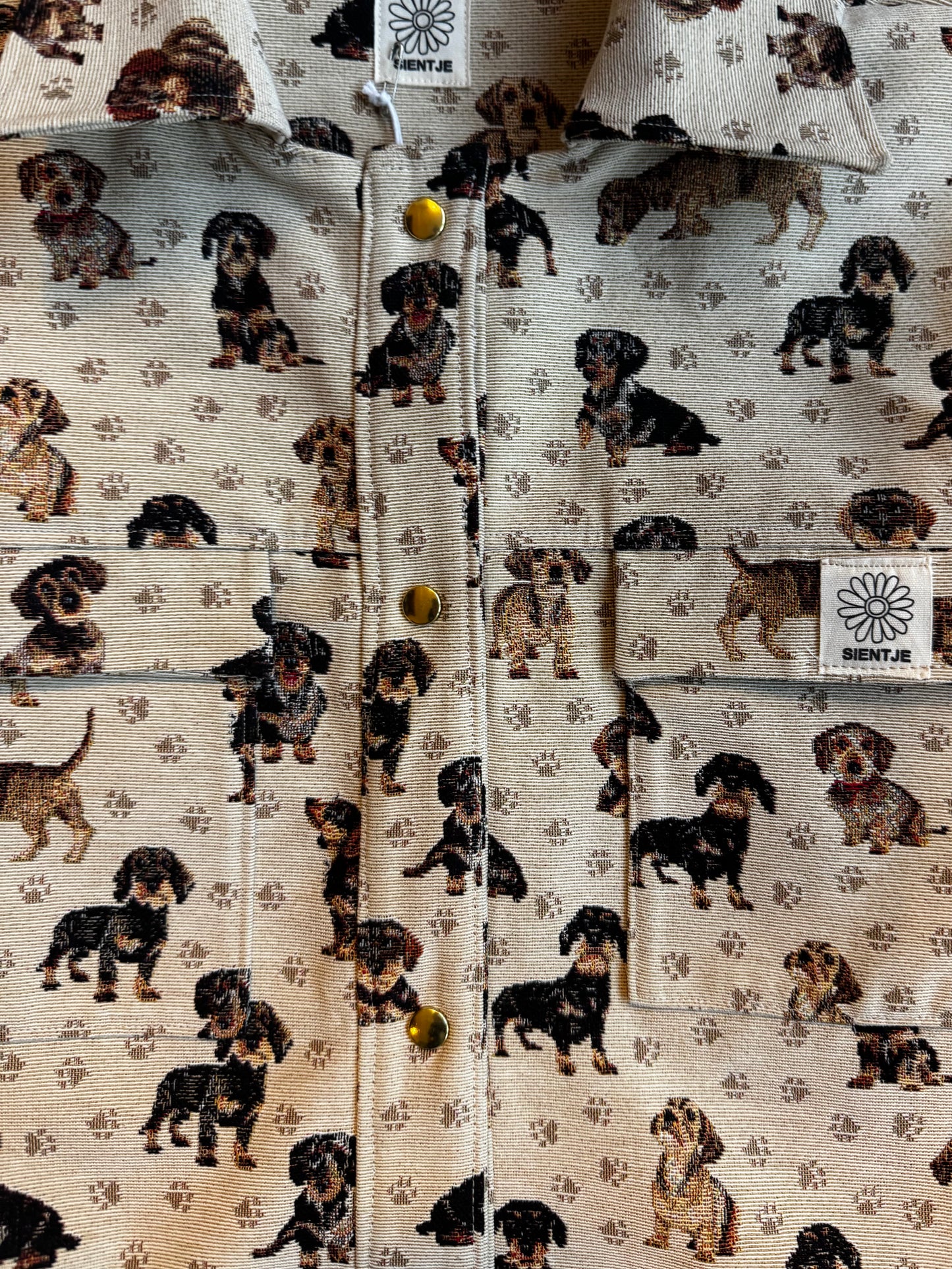 Jas in teckel print met borstzakken en drukknopen