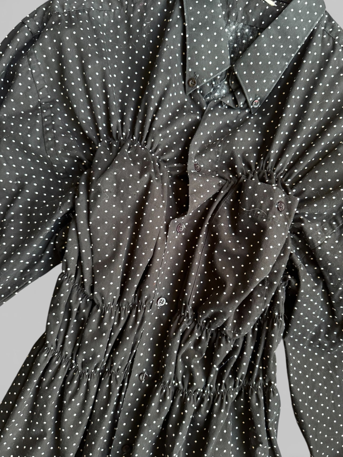 REWORK zwart wit getipte getailleerde blouse