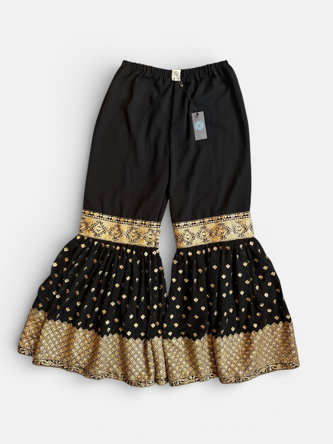 REWORK zwarte broek met elastiek en gouden flare pijpen