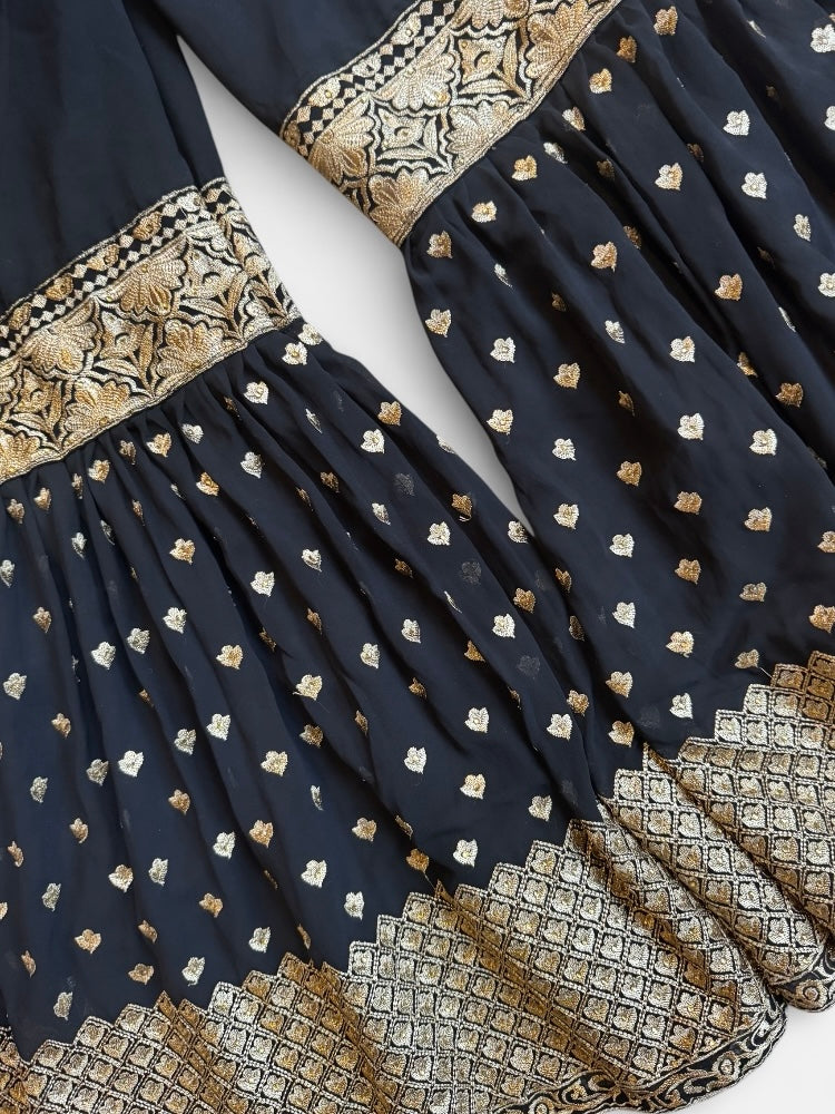 REWORK zwarte broek met elastiek en gouden flare pijpen