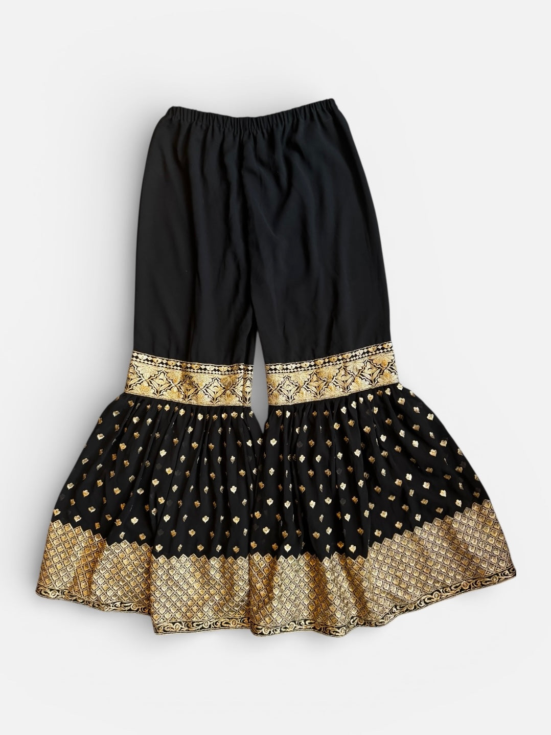 REWORK zwarte broek met elastiek en gouden flare pijpen