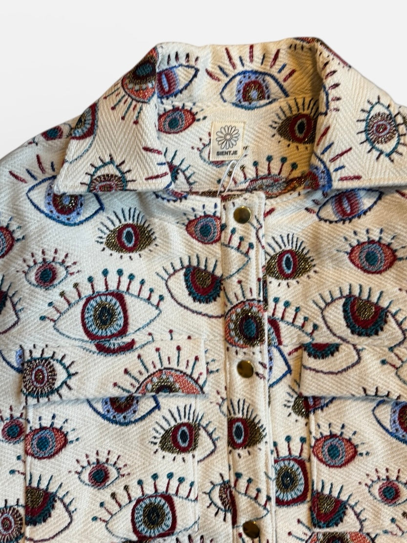 Jas in ogen print met borstzakken en drukknopen