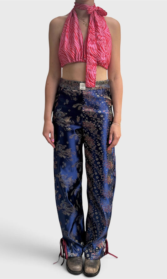 Broek met strikken in glimende stof