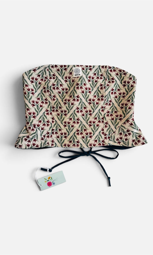 Reversible corset in donkergroen en tulpen stof