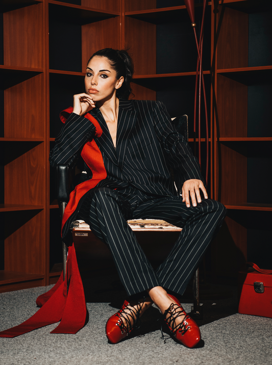 REWORK zwart gestreepte pantalon met rode strik